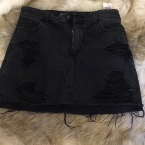 Black distressed denim skirt
